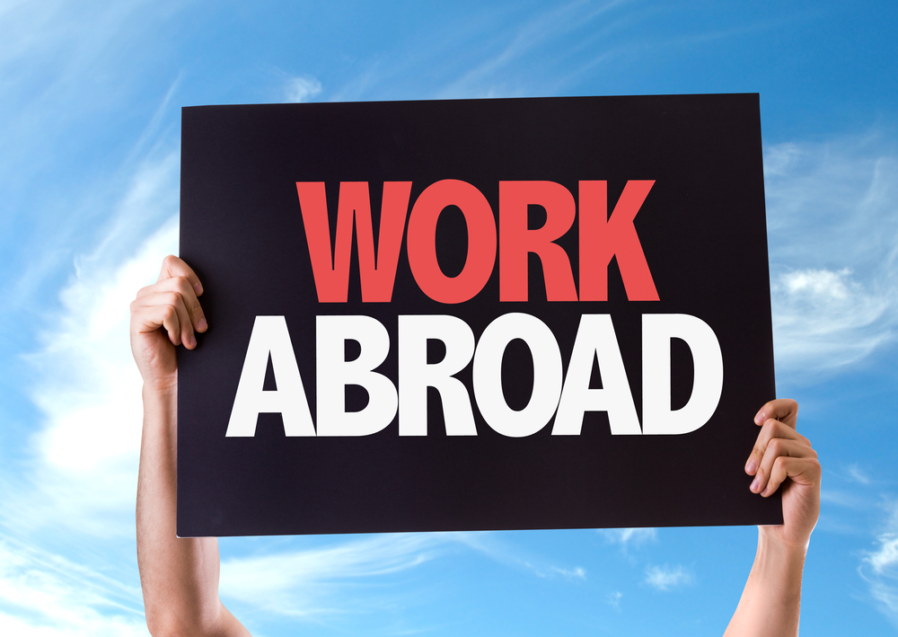 Work Abroad card with sky background